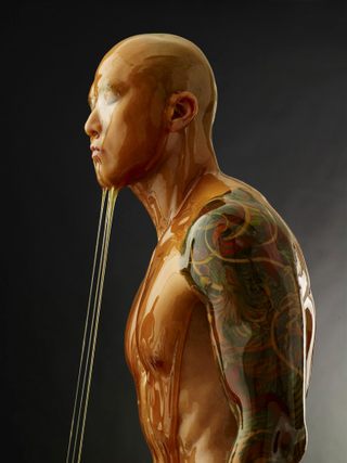 Illustration for article titled Amazing photos of naked people completely covered in honey (NSFW)